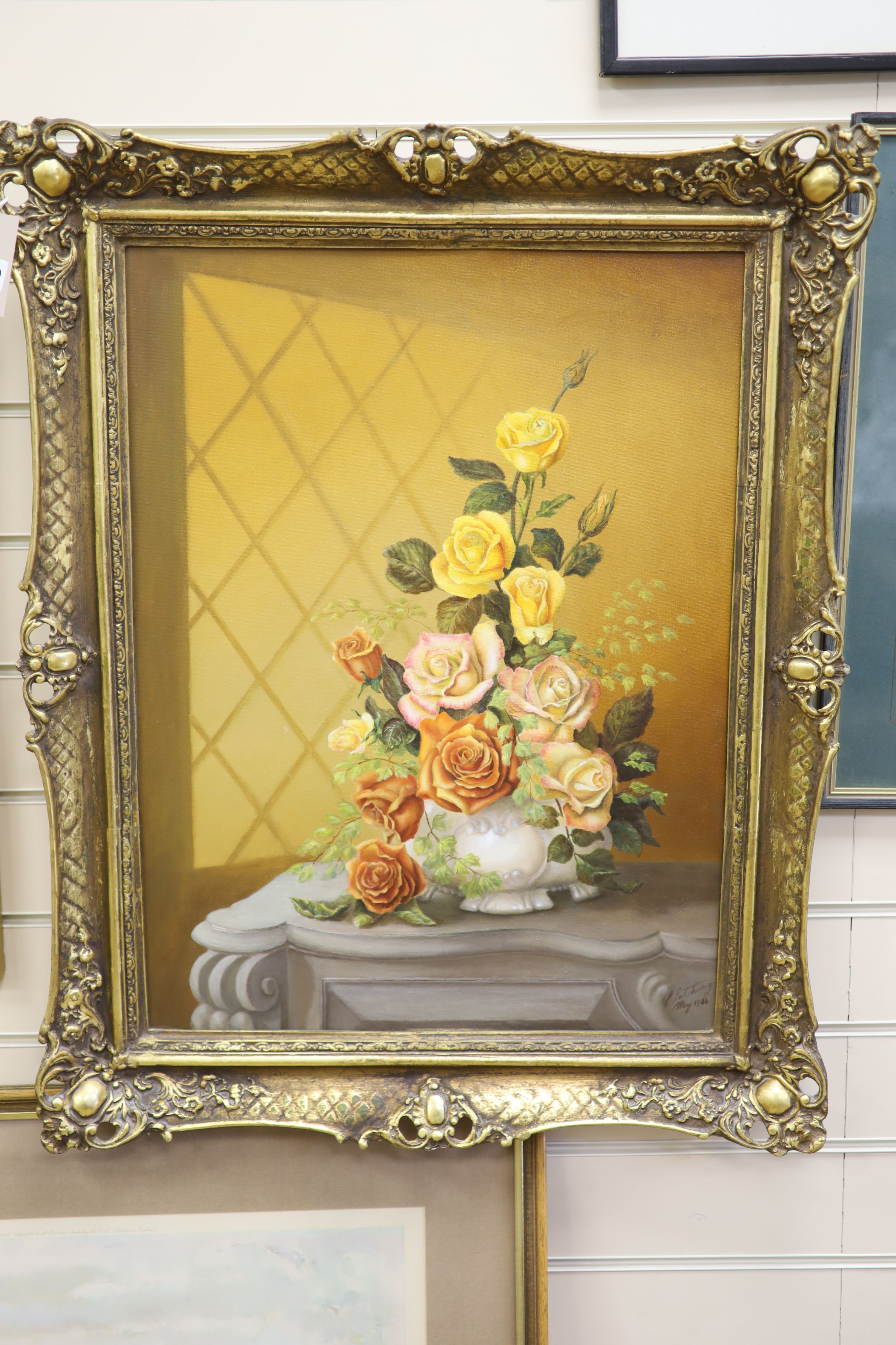 P. Patching, Still life of roses in a vase on a mantelpiece, indistinctly signed, oil on canvas, 60 x 45cm
